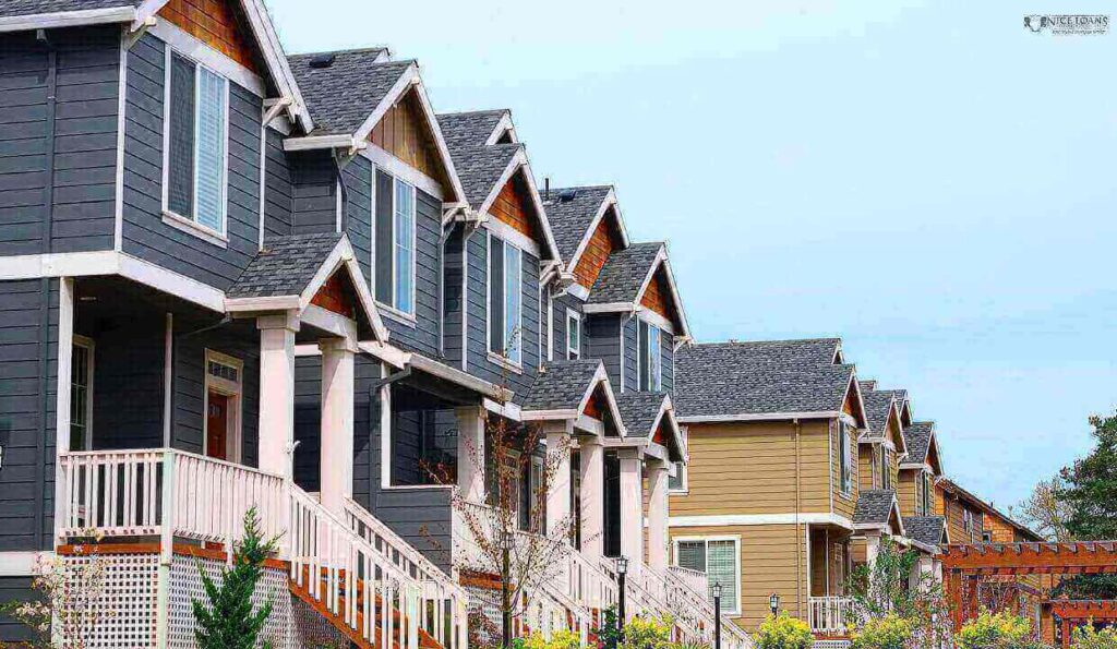 a row of modern homes lined side by side. 