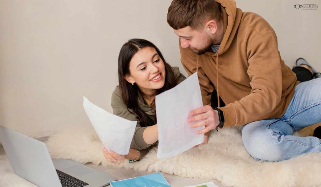A couple looking into the first home buyers grant for their new home in Victoria.