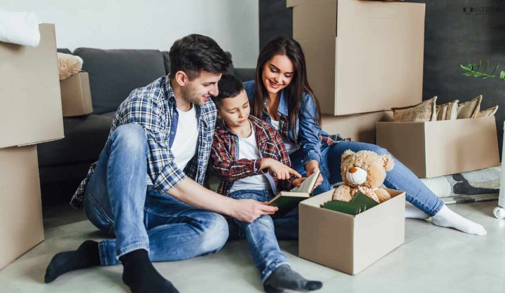 a happy family moving into their first home. 