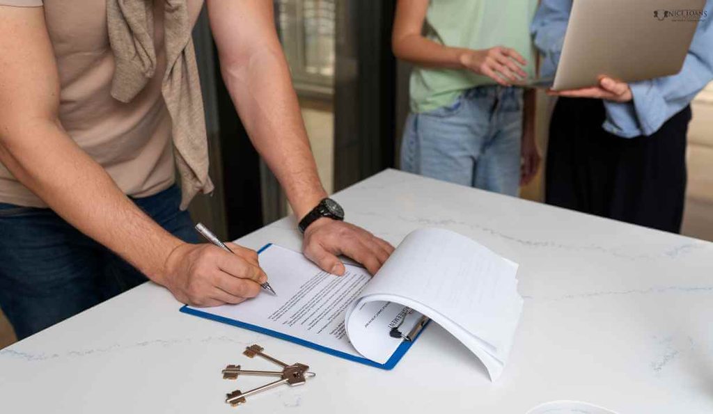 side view of a buyer signing a property lease with two agents beside him